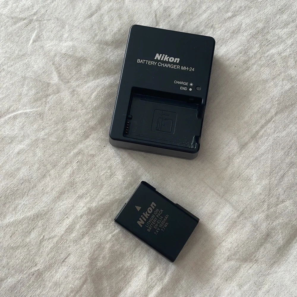 Nikon Camera with additional Lens, charger and cover